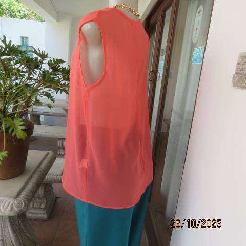 G mtr sheer polyester crimson slip over top. V neck with pleat. Size 36