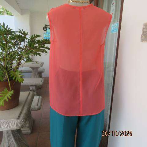 G mtr sheer polyester crimson slip over top. V neck with pleat. Size 36