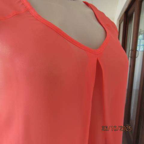 G mtr sheer polyester crimson slip over top. V neck with pleat. Size 36