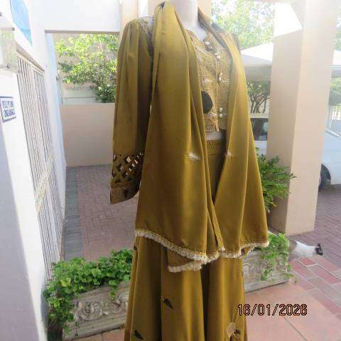 Boutique made 3 pc Islamic marigold colour silky polyester outfit with rich embellishment. Size 38