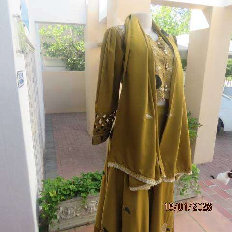Boutique made 3 pc Islamic marigold colour silky polyester outfit with rich embellishment. Size 38