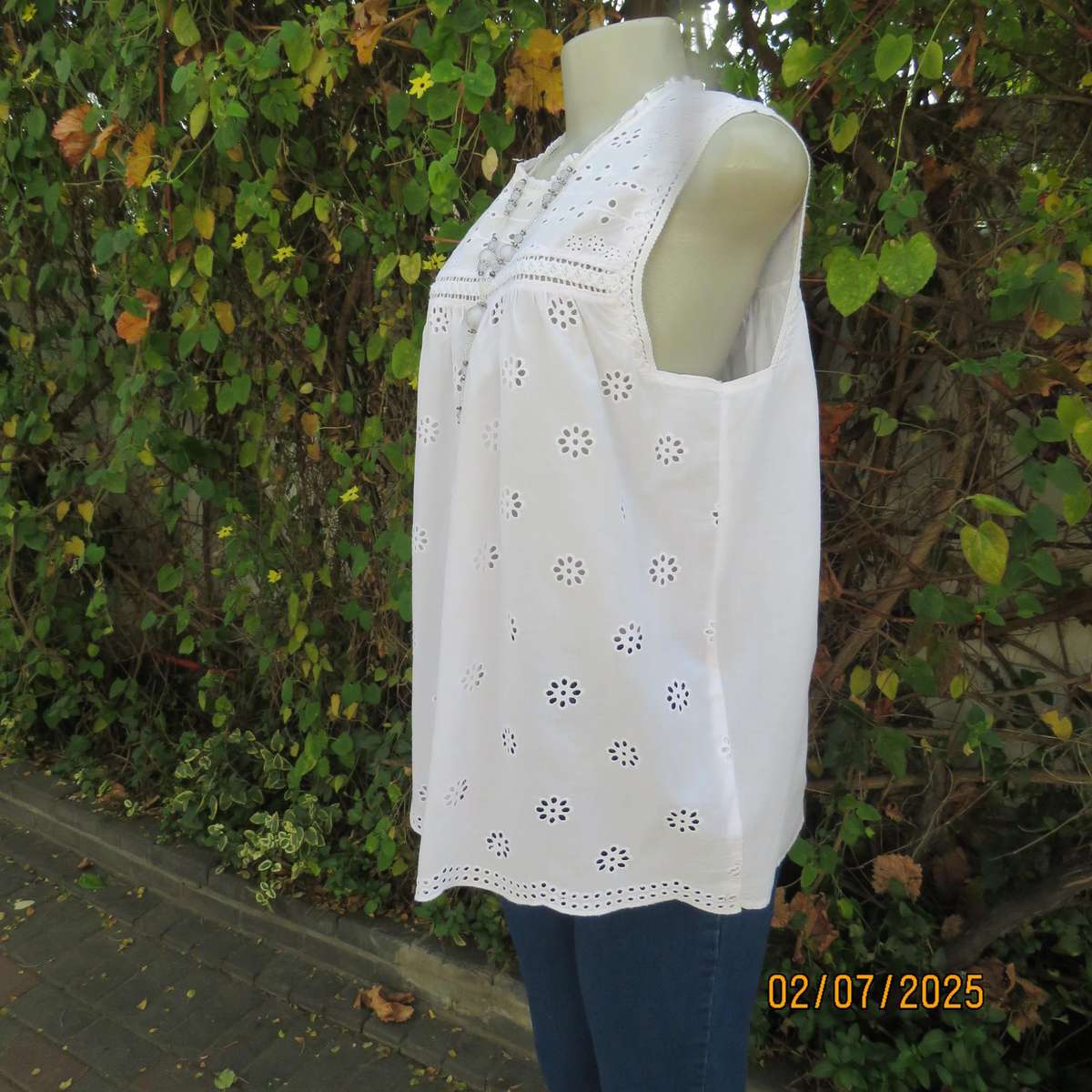 REAL WOMAN white fine cotton sleeveless top with eyelet embroidery on front. Size 40