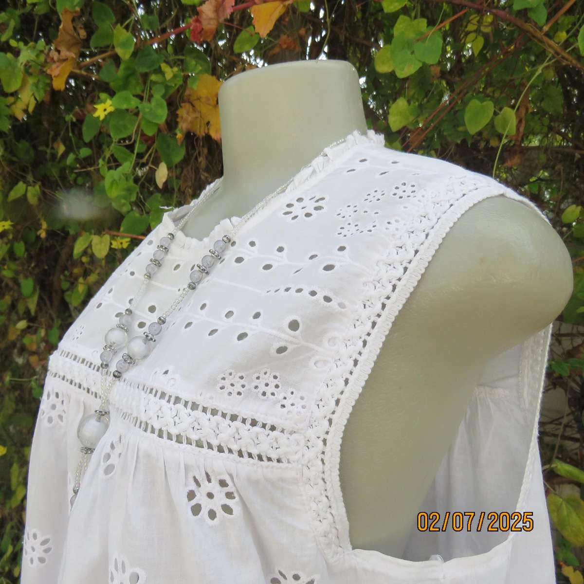 REAL WOMAN white fine cotton sleeveless top with eyelet embroidery on front. Size 40