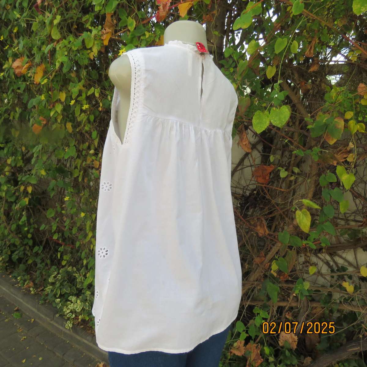 REAL WOMAN white fine cotton sleeveless top with eyelet embroidery on front. Size 40