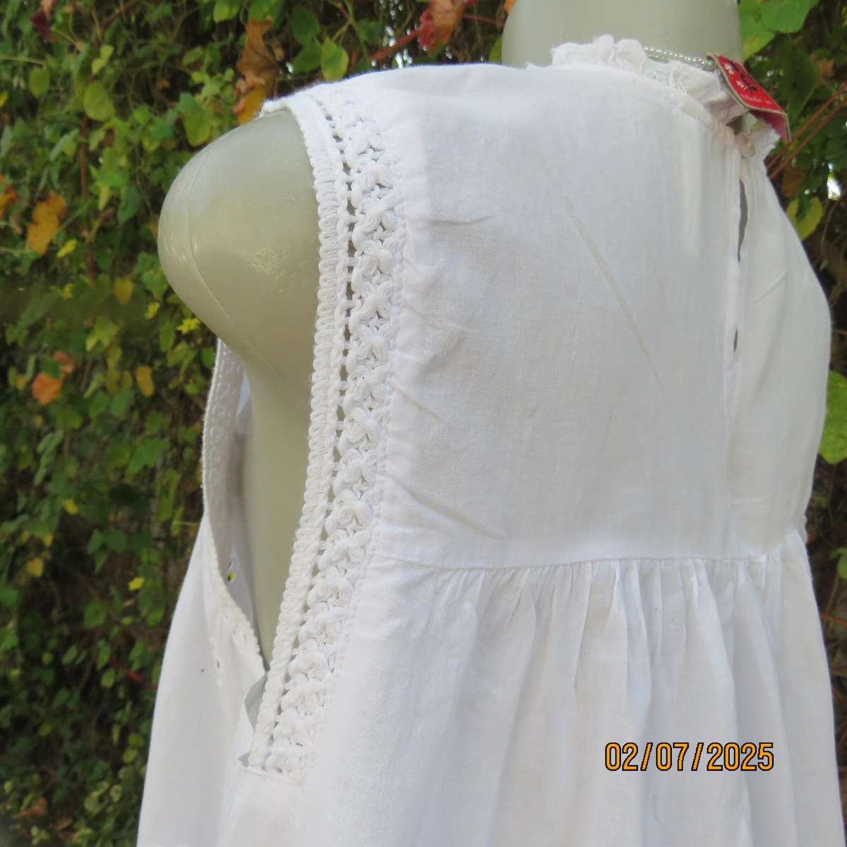 REAL WOMAN white fine cotton sleeveless top with eyelet embroidery on front. Size 40