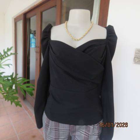 SHEIN long sleeve black stretch polyester long sleeve top with elastic shoulders. Size 34-36