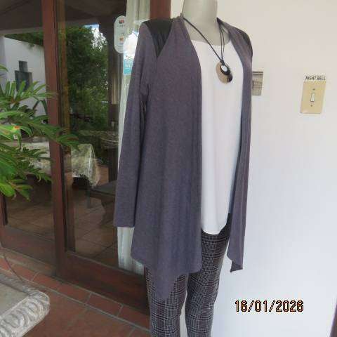 Ash grey long sleeve cover-up with black leather look shoulder-back inlays. Waterfall style. Size 32