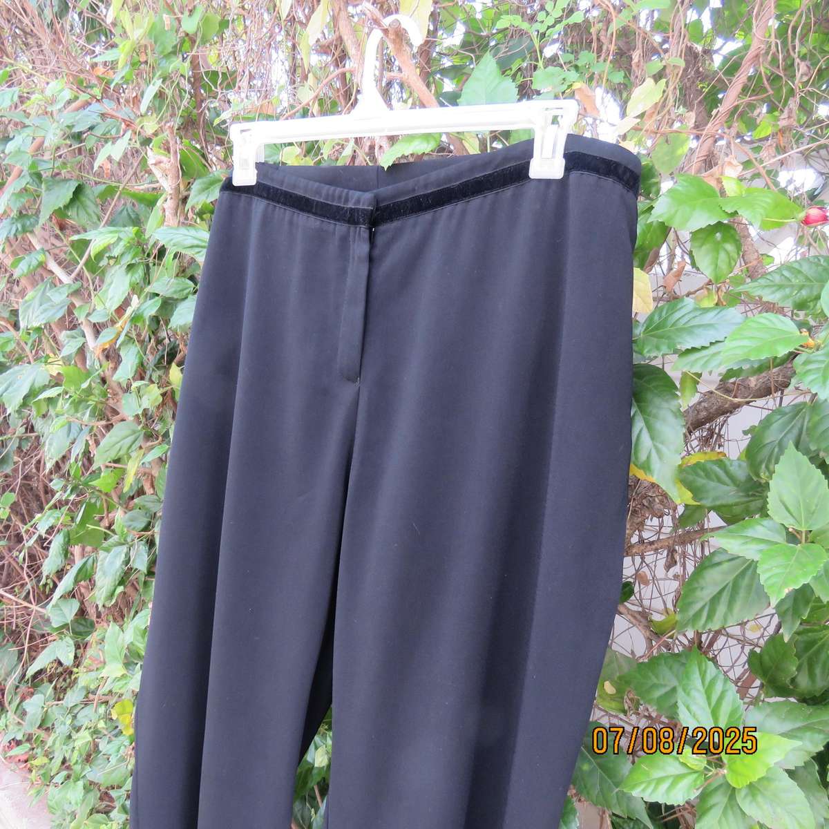 DONNA CLAIRE very black smart polyester pants. Size 44+.Velvet front strip.
