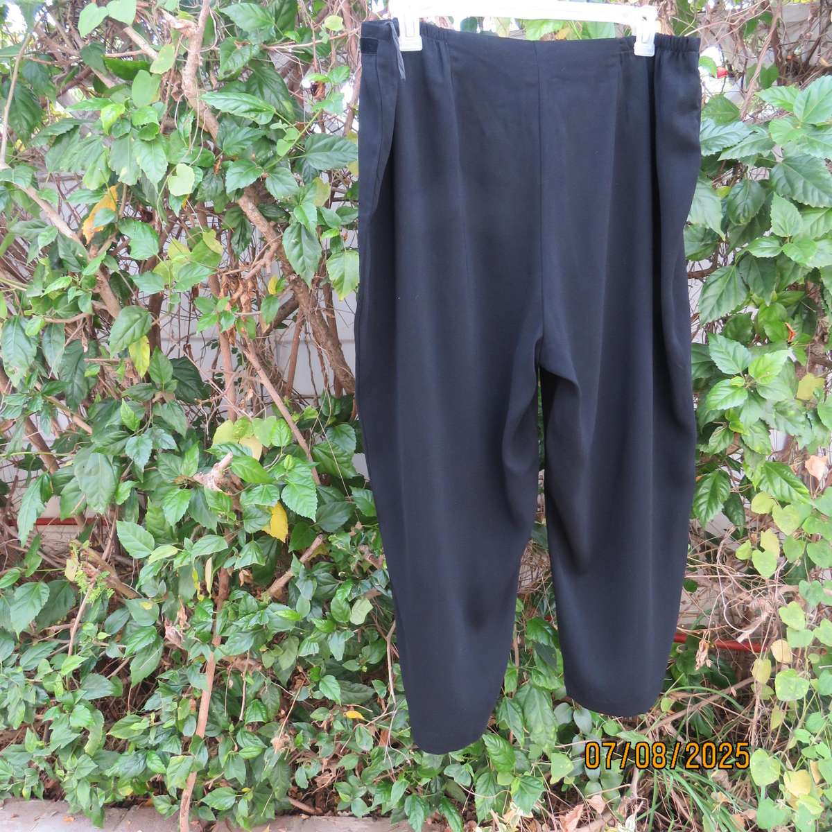 DONNA CLAIRE very black smart polyester pants. Size 44+.Velvet front strip.
