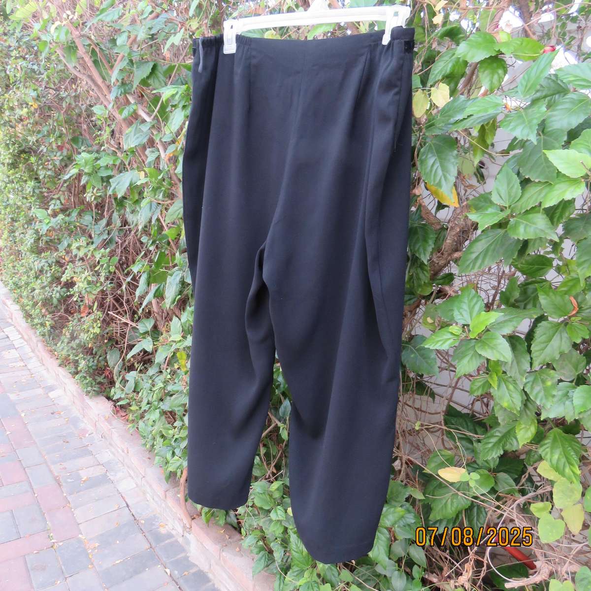 DONNA CLAIRE very black smart polyester pants. Size 44+.Velvet front strip.
