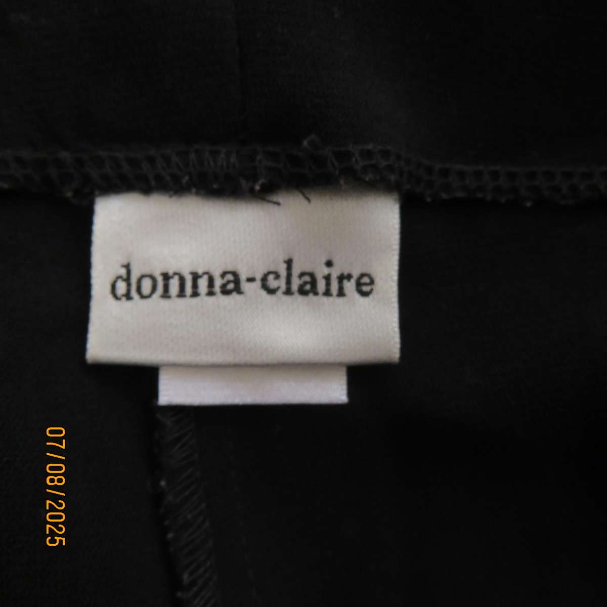 DONNA CLAIRE very black smart polyester pants. Size 44+.Velvet front strip.
