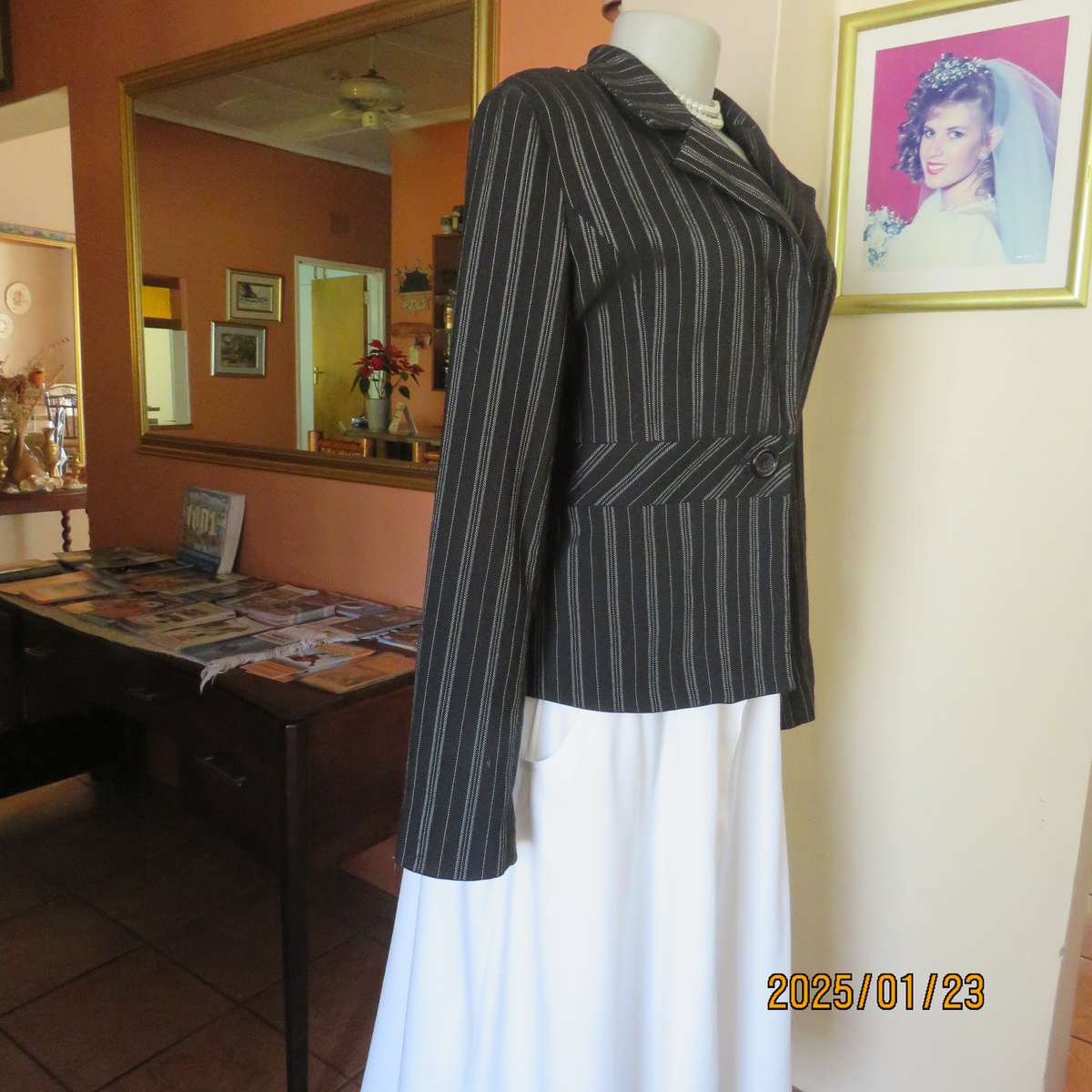 Smart long sleeve black-silver vertical striped fully lined jacket. Size 36. Close 1 button. As new