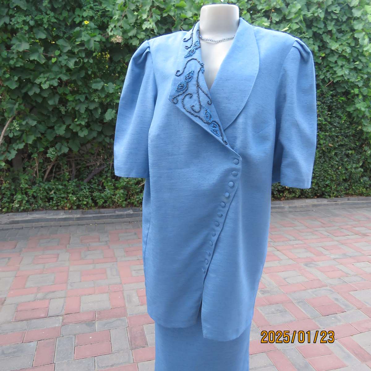 Boutique made 2 pc steel blue textured satin fully lined skirt suit. With embellished collar.Size 42
