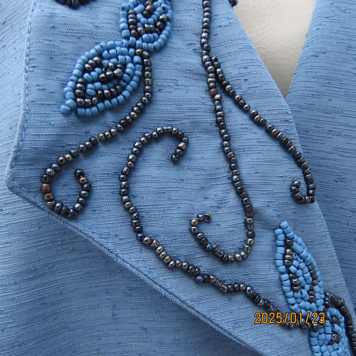 Boutique made 2 pc steel blue textured satin fully lined skirt suit. With embellished collar.Size 42