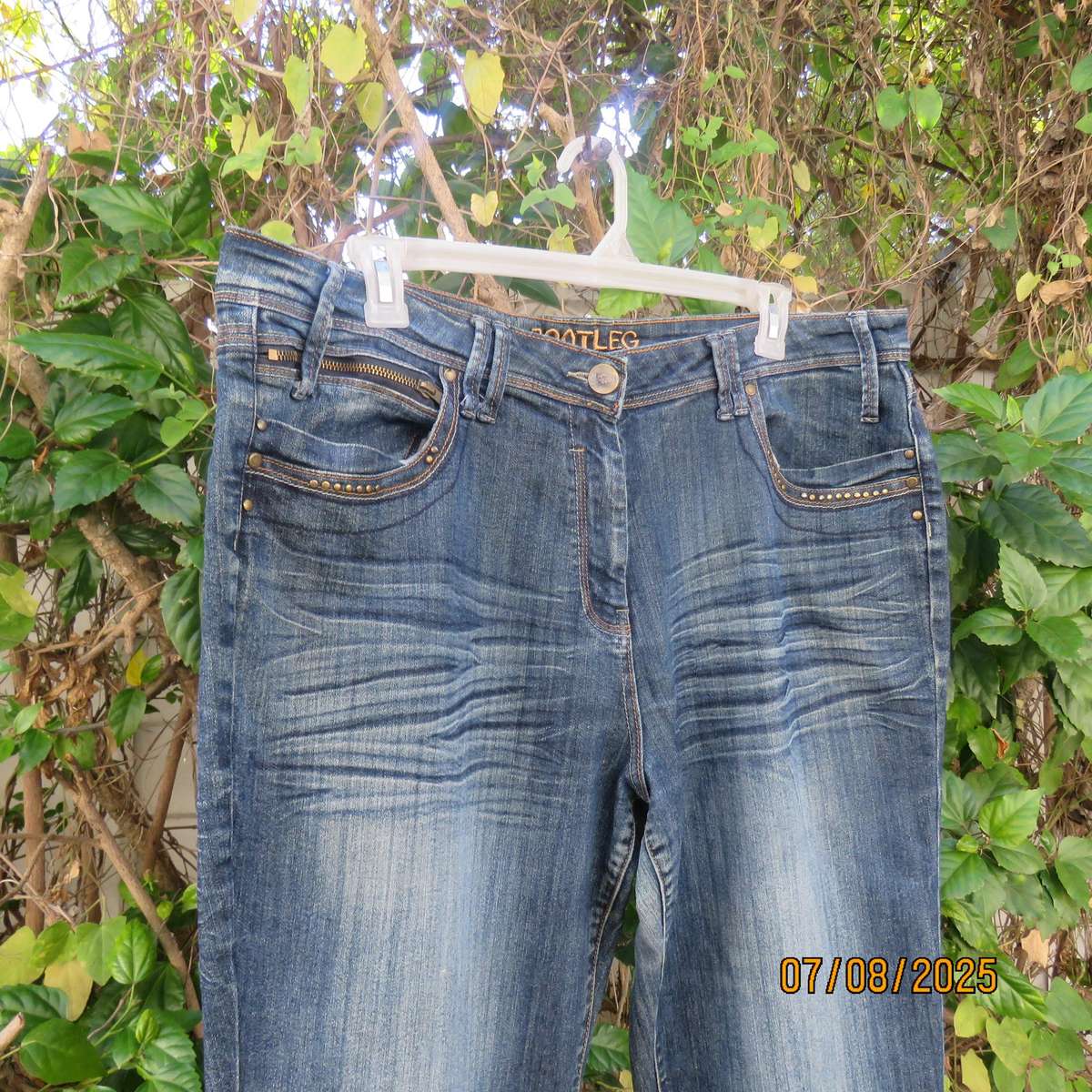 Modern blue denim bootleg jeans size 46. Back-front pockets. As new