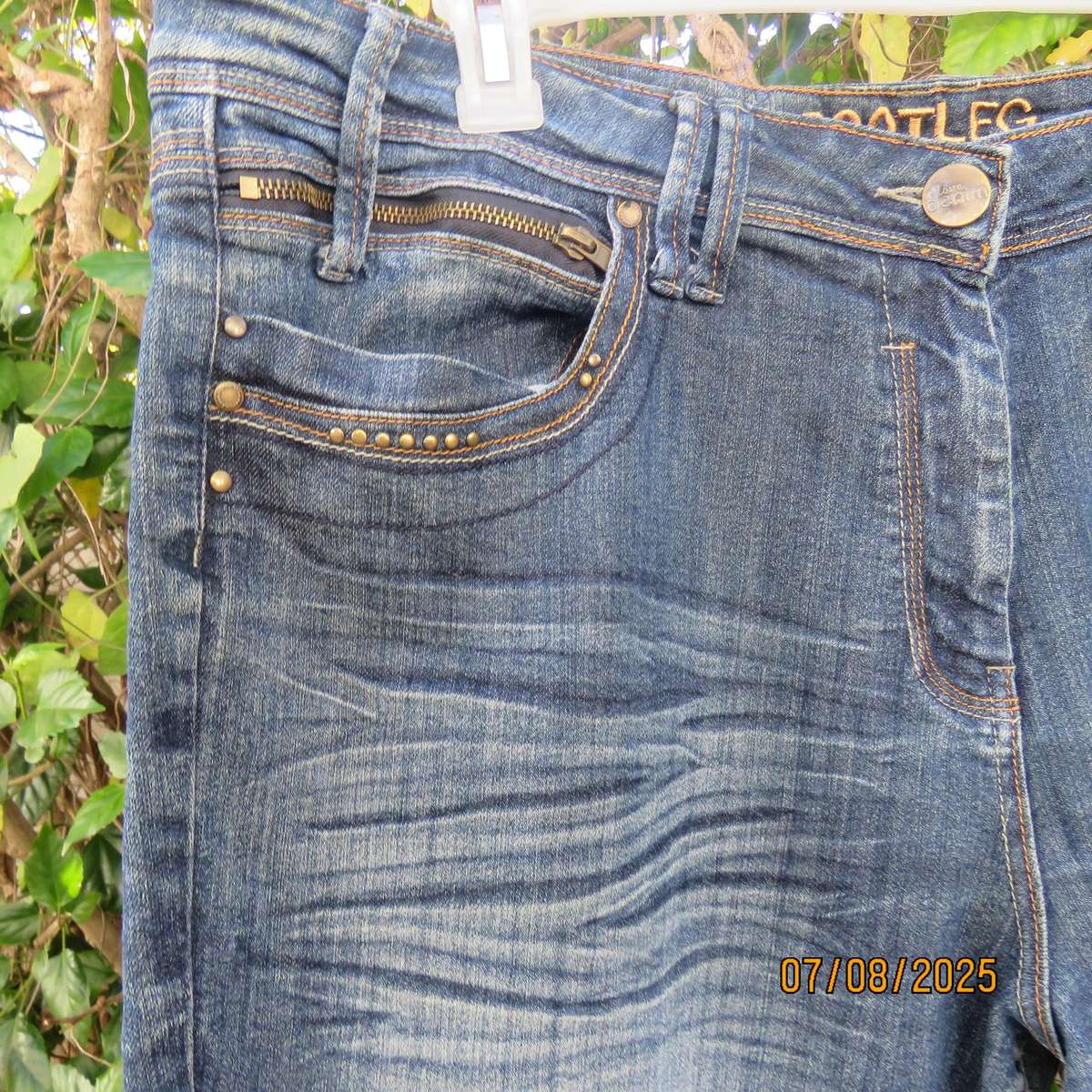 Modern blue denim bootleg jeans size 46. Back-front pockets. As new