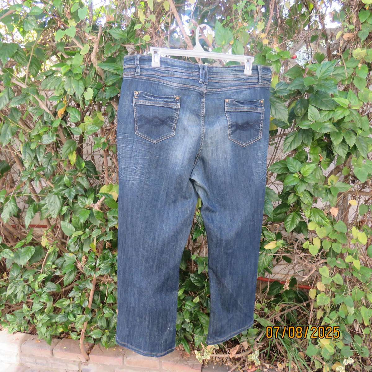 Modern blue denim bootleg jeans size 46. Back-front pockets. As new