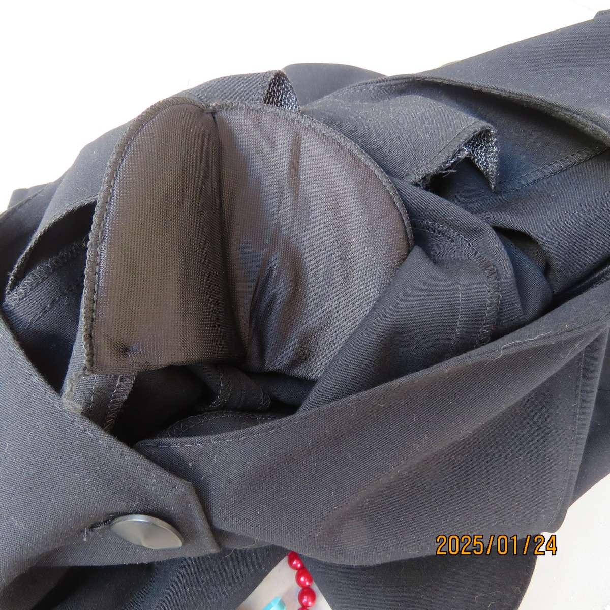 Elegant black short sleeve firm polycotton collarless jacket. Four button closure. Size 40. As new