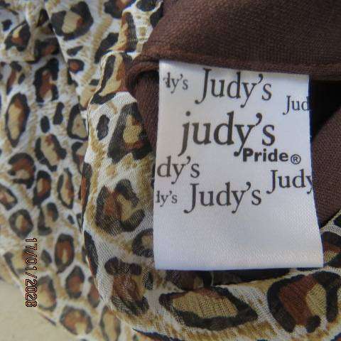 JUDY'S PRIDE animal print sheer polyester with brown stretch poly lining. Cowl neckline. Size 38