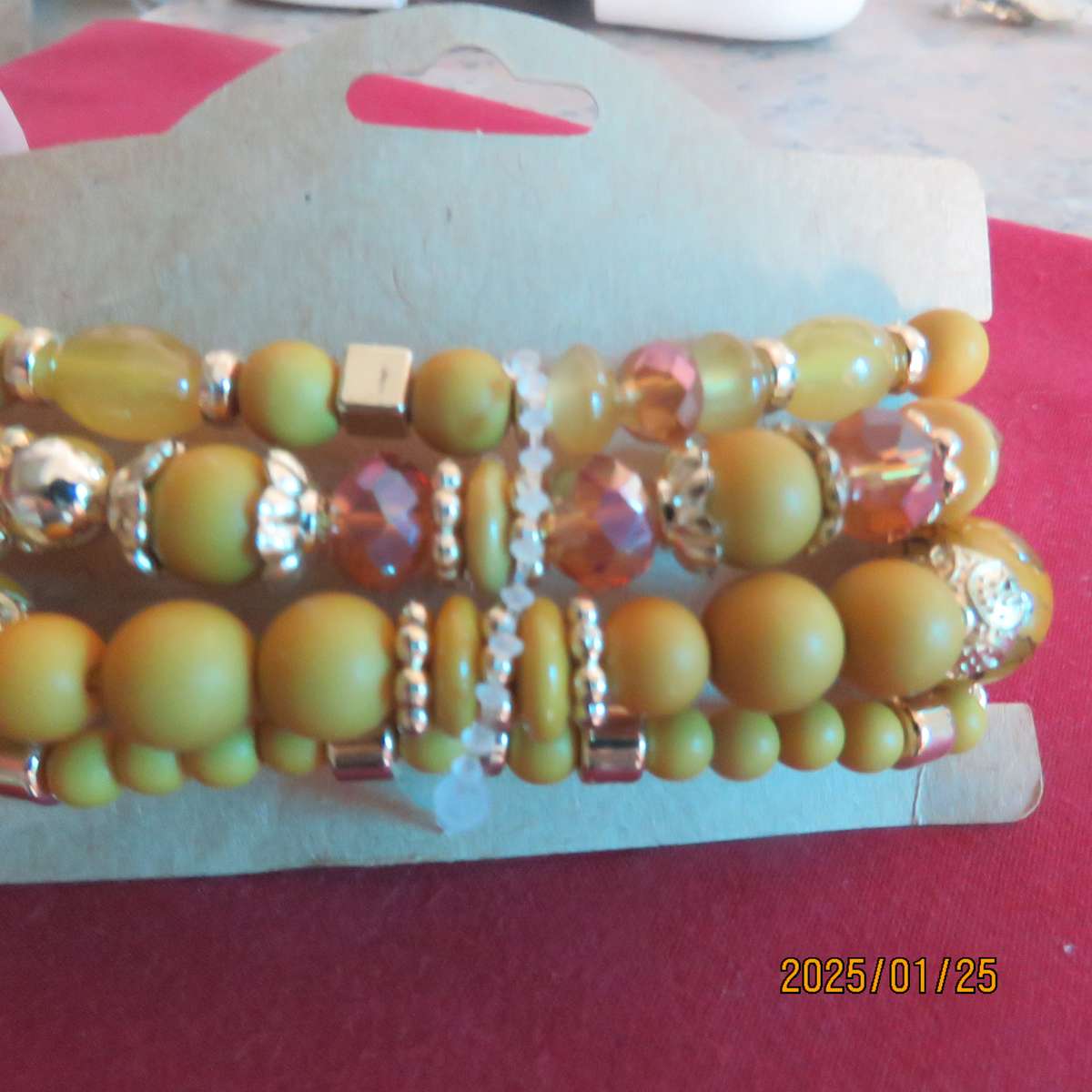 Luxury beaded set of 4 stretch autumn colour bangles with some gold. New item.