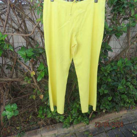 Ladies linen-cotton blend yellow pants with drawstring waist and cargo pockets size 38