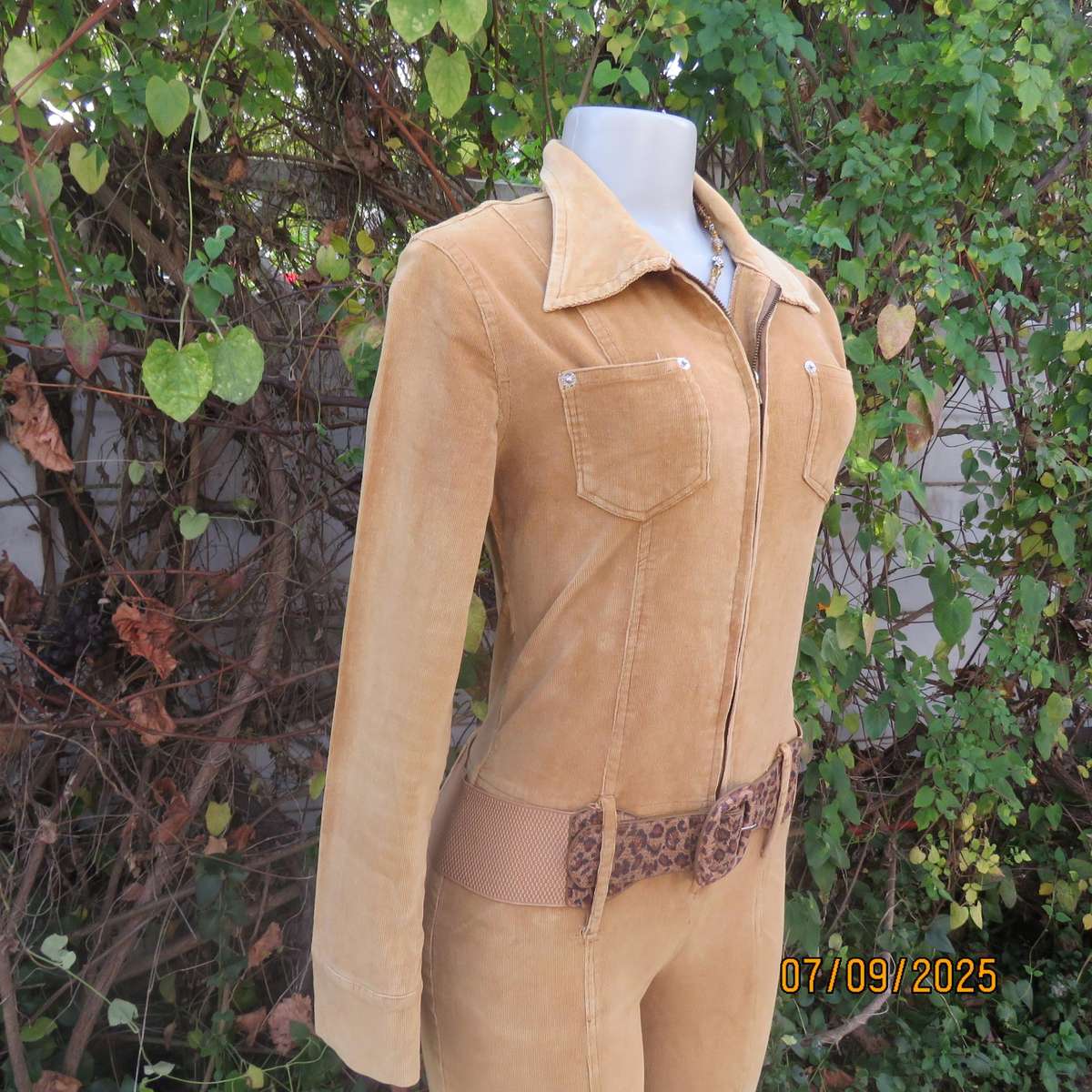 LUCY'S tan stretch corduroy jumpsuit size 32. Zip-up front. Bell bottom legs.