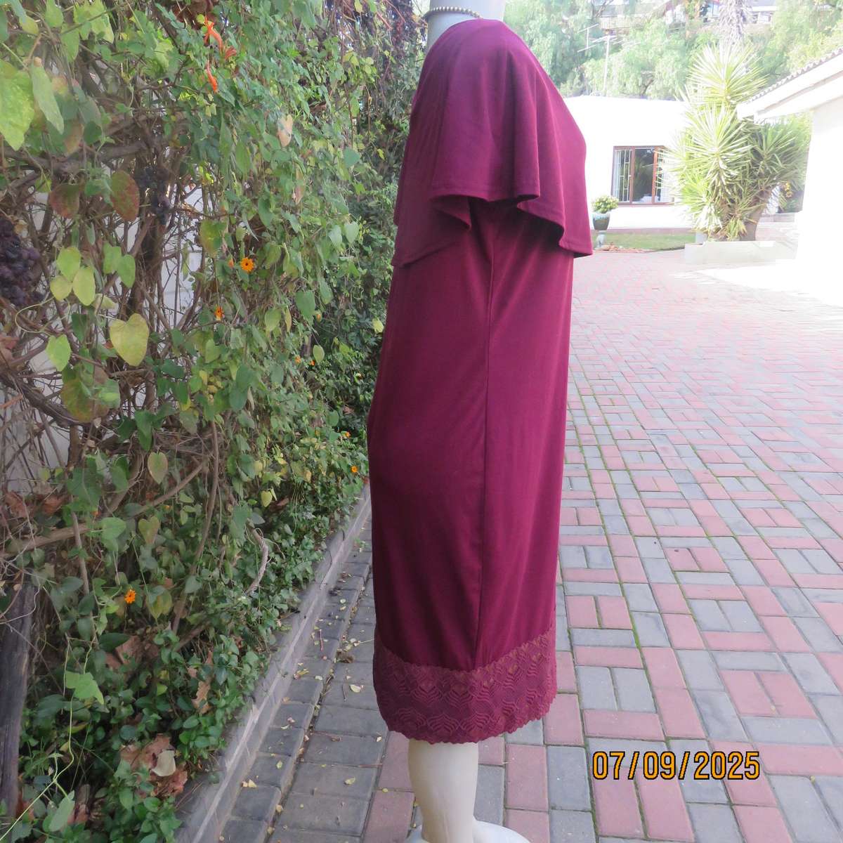 Maroon sleeveless shift dress with wide Bertha collar. Lace hem border. Size 38
