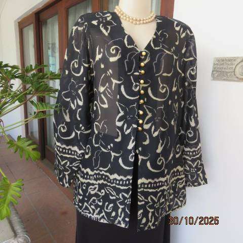 TRUWORTHS black sheer polyester long sleeve top with cream flowers. Size 40