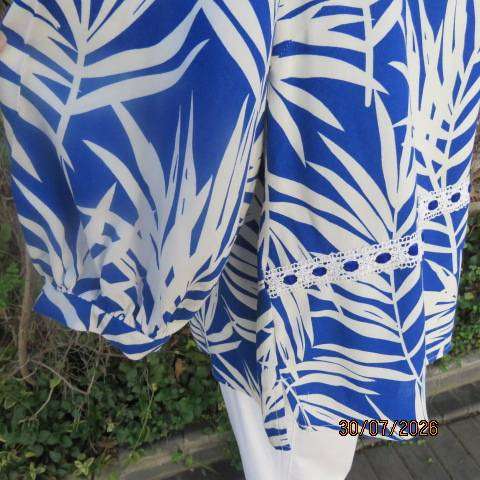 MILADY'S white and blue leaf pattern slip-over viscose top with banded V neckline, size 44-46