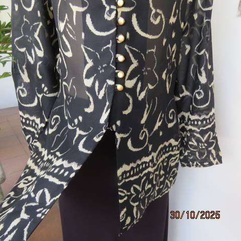 TRUWORTHS black sheer polyester long sleeve top with cream flowers. Size 40
