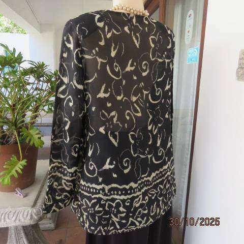 TRUWORTHS black sheer polyester long sleeve top with cream flowers. Size 40