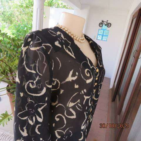 TRUWORTHS black sheer polyester long sleeve top with cream flowers. Size 40