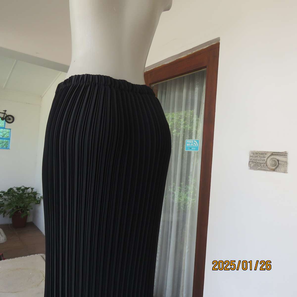 CHARISMA black fine permanent pleated polyester skirt size 36 with elasticated waist. Ankle length