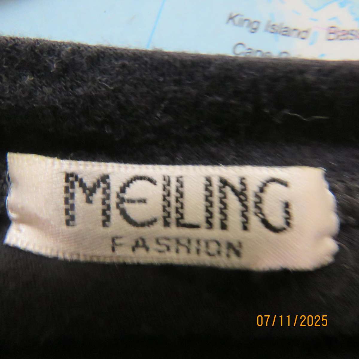 Black stretch viscose top with kimono style short sleeves. Front silver-grey print. Size 40