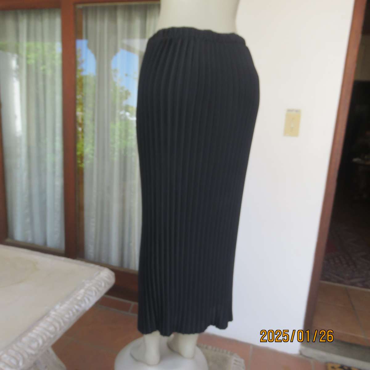 CHARISMA black fine permanent pleated polyester skirt size 36 with elasticated waist. Ankle length