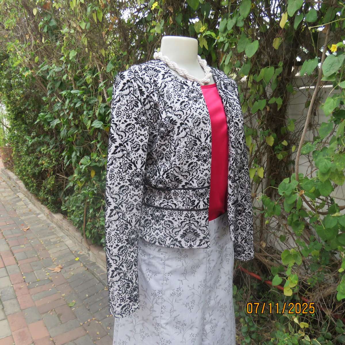Silver grey stretch polyester long sleeve open elegant jacket.Black velvet baroque embossed. Size 32