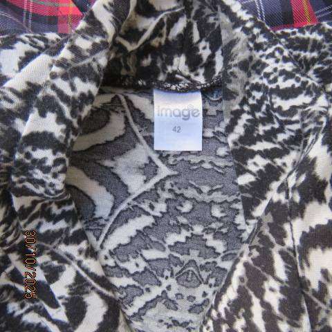 Animal print long sleeve top in black-white-grey. Warm soft polyester. Size 42