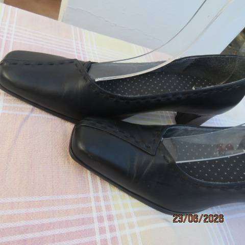 Black ladies low heel formal shoes with leather uppers and square points, size 7