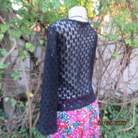 Black stretch acrylic lace long sleeve open front top with one button and loop closure size 34-36