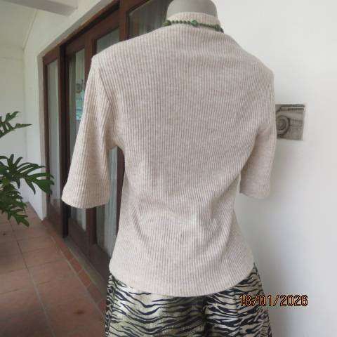 FOSHINI rib pattern mottled beige colour slip over tetron-rayon stretch fabric. Size 36