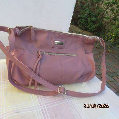 Pink PVC sling bag with side bags and front zipped compartments polyester lining