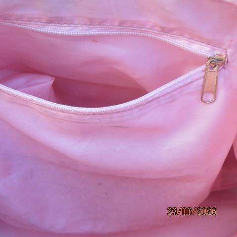 Pink PVC sling bag with side bags and front zipped compartments polyester lining