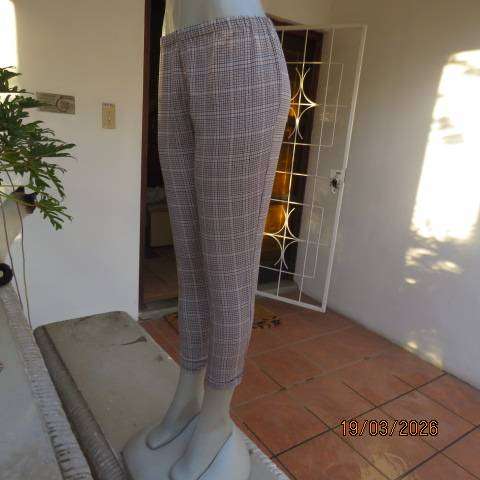 Checked beige-tan and black stretch polyester jeggings with elasticated waist, size 32
