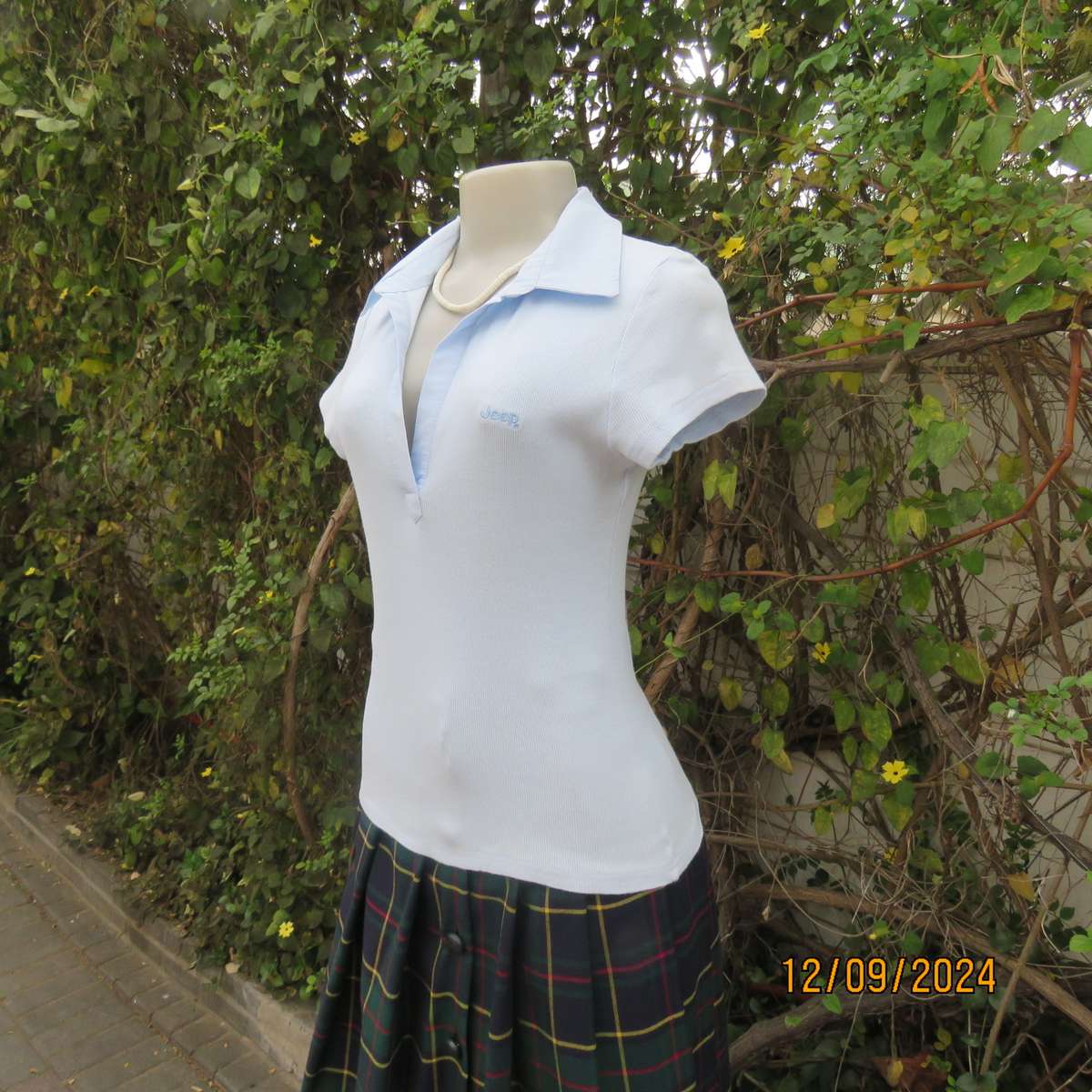 High quality baby blue capped sleeve ribbed cotton stretch JEEP top. Open cotton collar. Size 34.