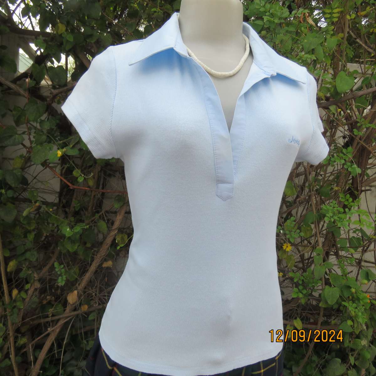 High quality baby blue capped sleeve ribbed cotton stretch JEEP top. Open cotton collar. Size 34.