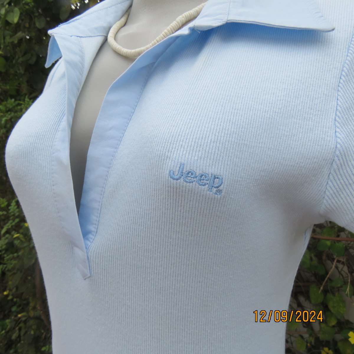 High quality baby blue capped sleeve ribbed cotton stretch JEEP top. Open cotton collar. Size 34.