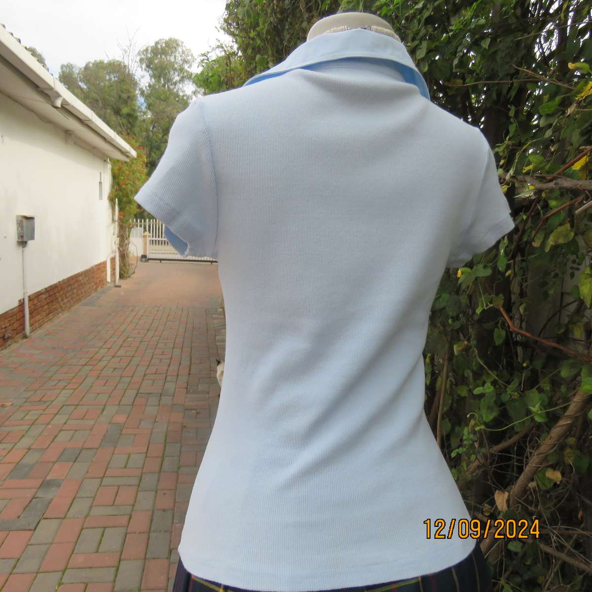 High quality baby blue capped sleeve ribbed cotton stretch JEEP top. Open cotton collar. Size 34.