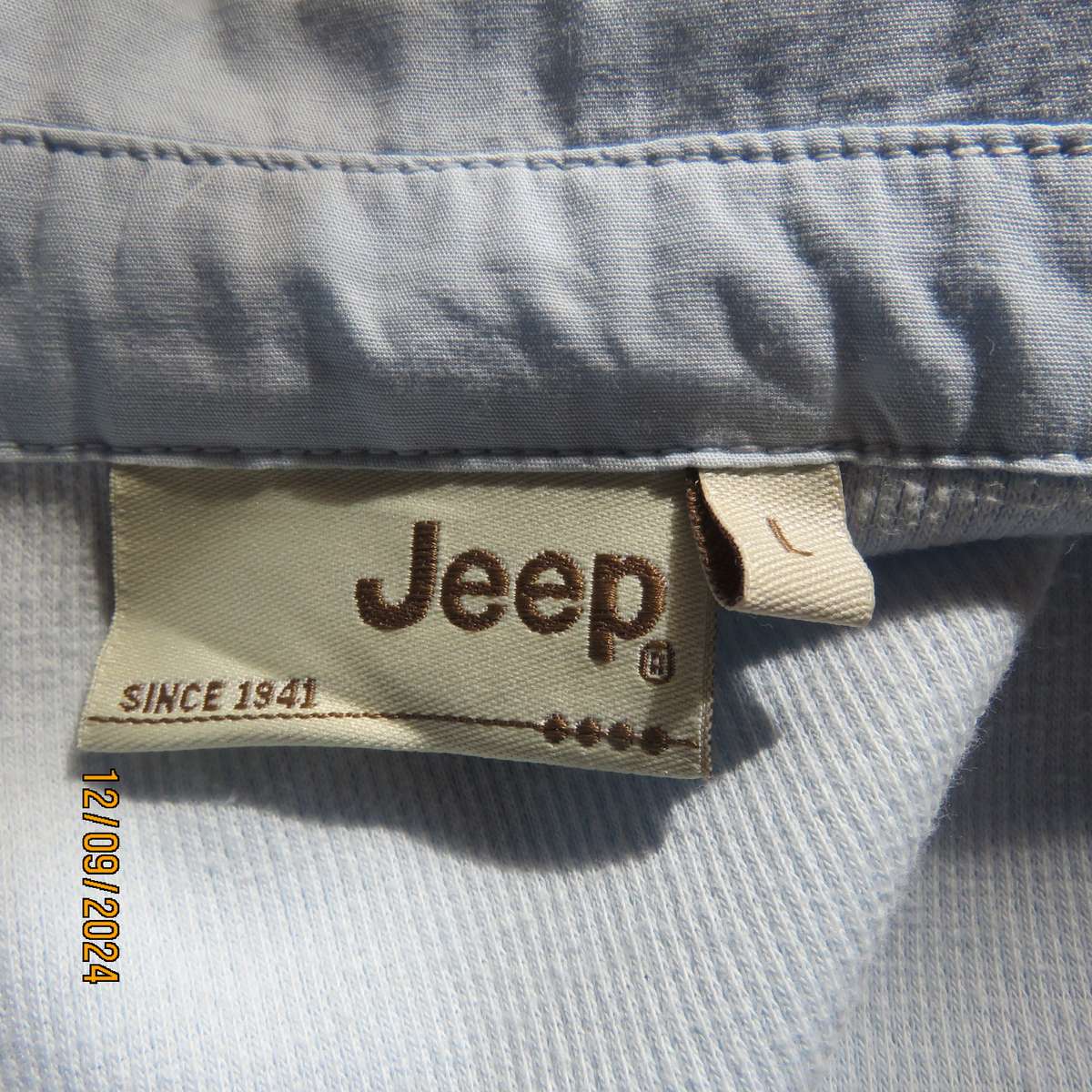 High quality baby blue capped sleeve ribbed cotton stretch JEEP top. Open cotton collar. Size 34.