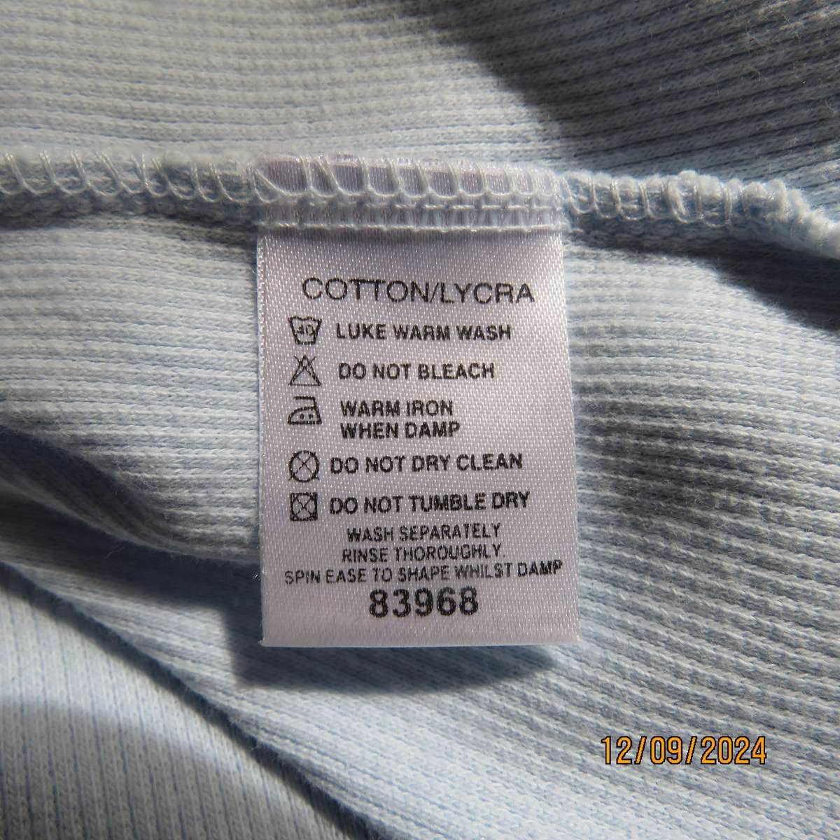 High quality baby blue capped sleeve ribbed cotton stretch JEEP top. Open cotton collar. Size 34.