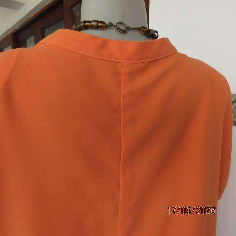 Miladys tangerine slip-over polyester top with tiny cut-on sleeves, size 44